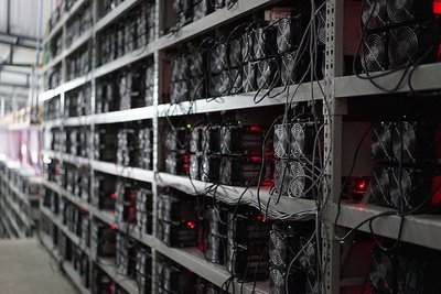 Aerial view of a large-scale mining farm showcasing the scale and infrastructure required for efficient cryptocurrency mining.